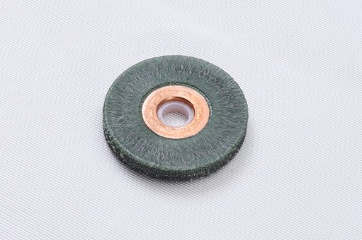 Rubber encapsulated wire brushes